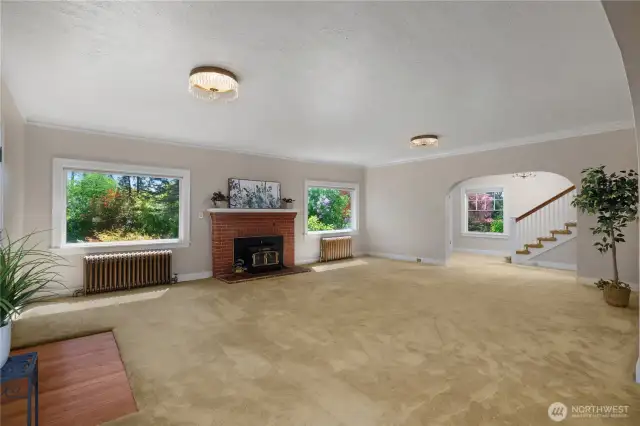 Graciously large living area with wood burning fireplace