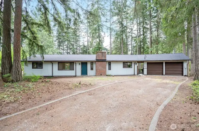 Front view from driveway looking South.