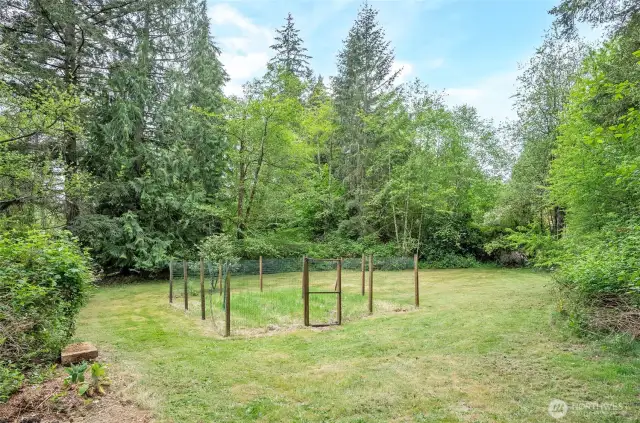 Lower field with a large fenced garden area.