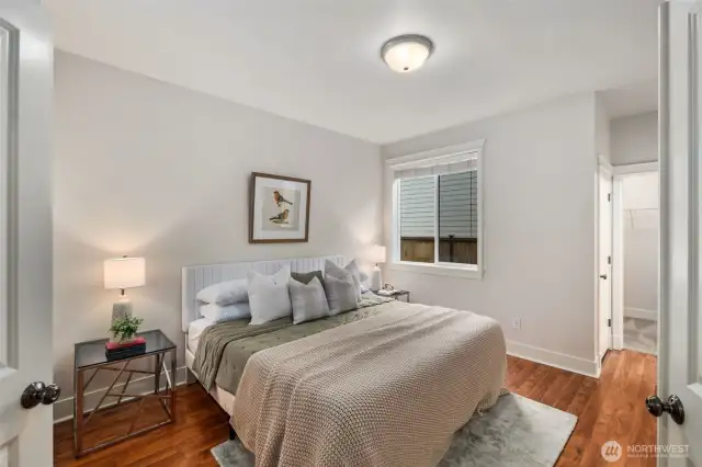 Main level opportunity for a second primary ensuite bedroom. Lareg walk in closet + linen closet + 3/4 bathroom complete this space.