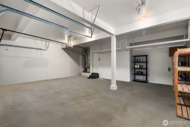Oversized 3 car garage. Freshly painted and complete with overhead storage.