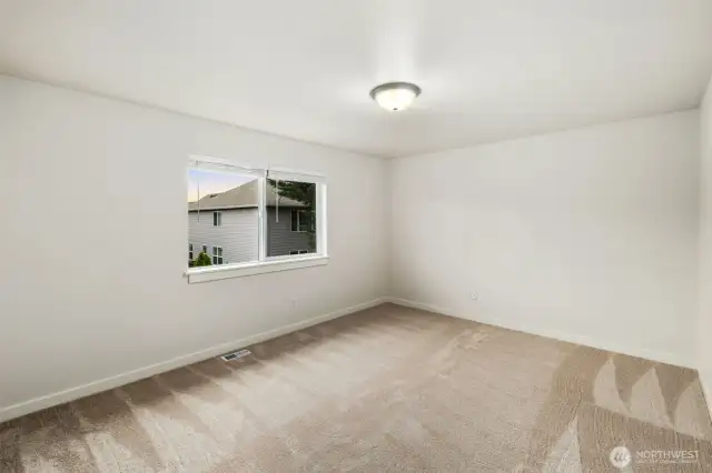 Guest bedroom 1 comlete with fresh paint + new carpet + walk in closet.