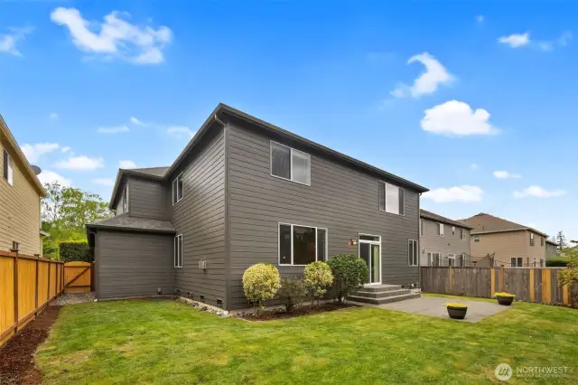 Manicured and mature private backyard.  Lots of opportunity here for outdoor gathering spaces and gardening.