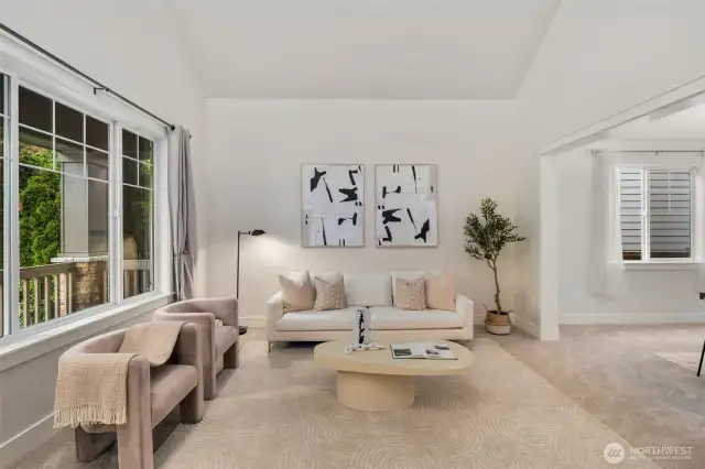 Formal and naturally-lit living space. New carpeting and freshly painted interior walls, trim and doors make this home move in ready.  Formal dining room to the right with an attached butler's pantry area.