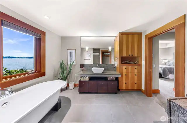 Primary Bathroom: soak in the lake views while soaking in your tub.