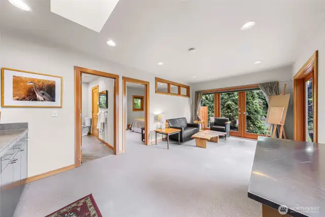 Sitting area, separate bed and 3/4 bathroom in the Guest House.