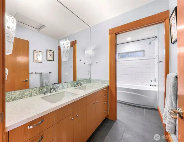 Upstairs bathroom with double sinks.