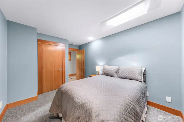 Upstairs bedroom with skylight.