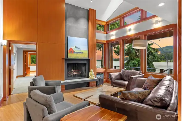 Vertical grain fir glows near the wood-burning fireplace with integrated propane log-lighter. Sunny lake sunsets are the perfect background while you unwind and connect.