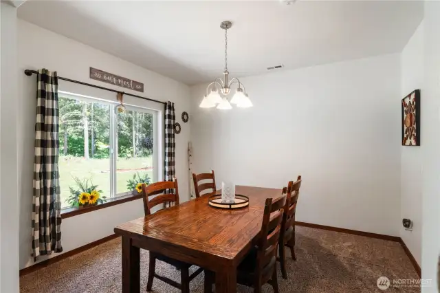 Formal dining room right off the kitchen.