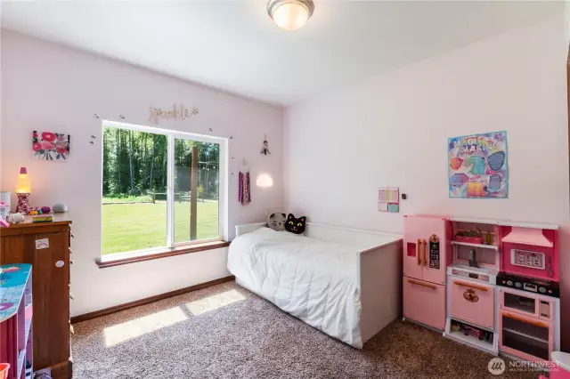 Bedroom #2. Home offers heat pump with air conditioning to save money and keep you comfortable all year long.