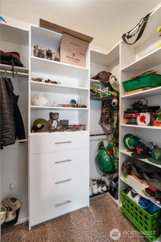 Walk-in closets in bedroom #2 and bedroom #3 also have the wonderful closet systems by ClosetsbyDesign.