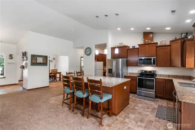 Gourmet kitchen with stainless steel appliances, undermount sink, and beautiful cabinets with crown molding.
