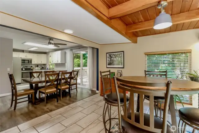 Savor meals in the solarium overlooking a private backyard and lush trees