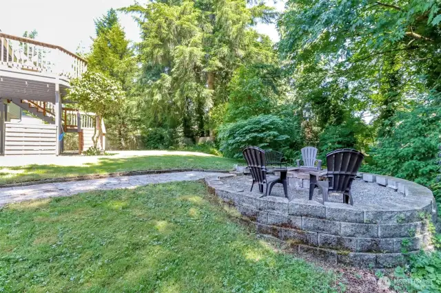 Enjoy s’mores around the firepit in the private backyard of this retreat.