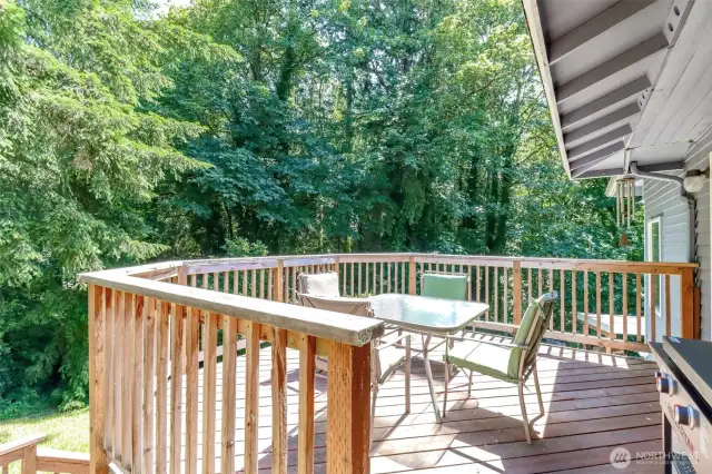 Tree-lined backyard offers a private getaway