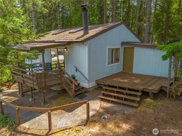 Welcome home with a covered deck and an open deck.