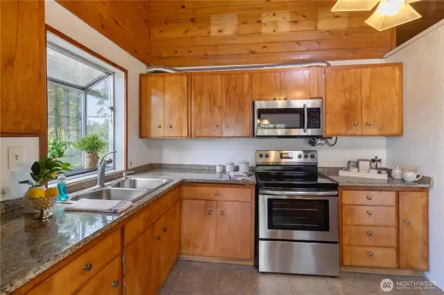 Kitchen with eating space.  Newer appliances. Window for plants or herbs!
