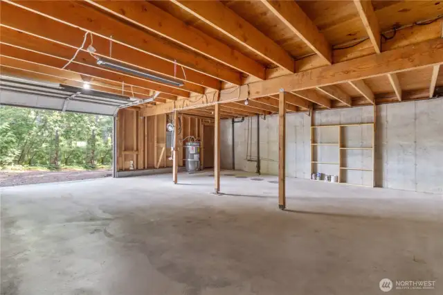Garage with shop area.  Well lit and ready for your project or goal!