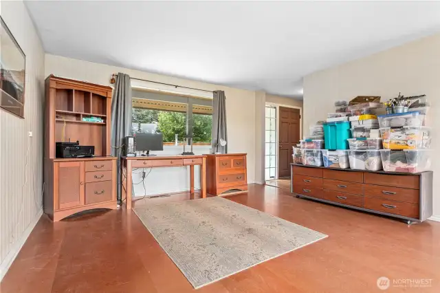 Living room, seller runs a small arts and crafts business out of the home.