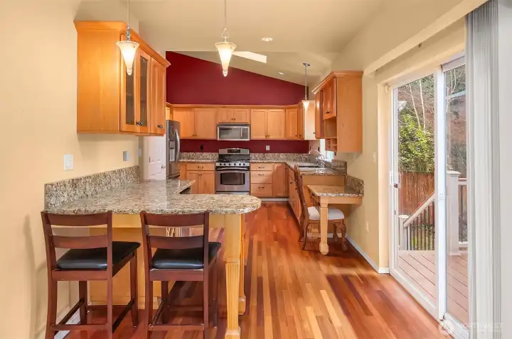 Cozy Kitchen Seating Area. Deck and Backyard Access Located off Kitchen
