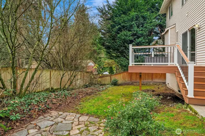 Paved Patio Area and Backyard. Side Yard has fenced dog run