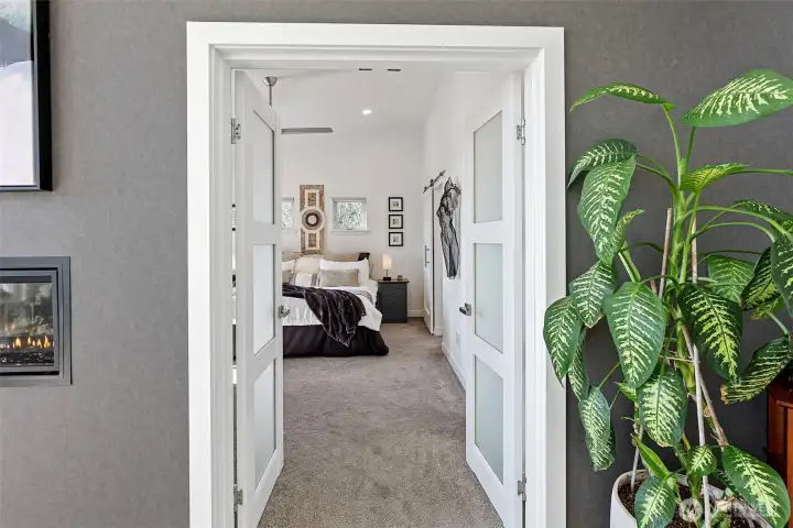 Double doors into the Primary bedroom are etched allowing light to transfer to both sides when closed. A walk in closet off to the right with pull outs and built ins creates wonderful storage just off the Primary bedroom and bath.