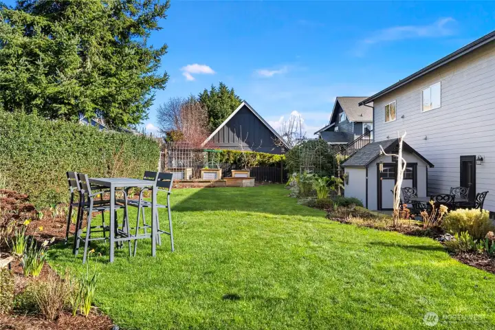 A gate off the driveway (not shown here) allows for easy delivery of gardening supplies.