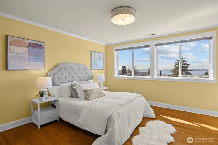 Primary bedroom with expansive view of the sound
