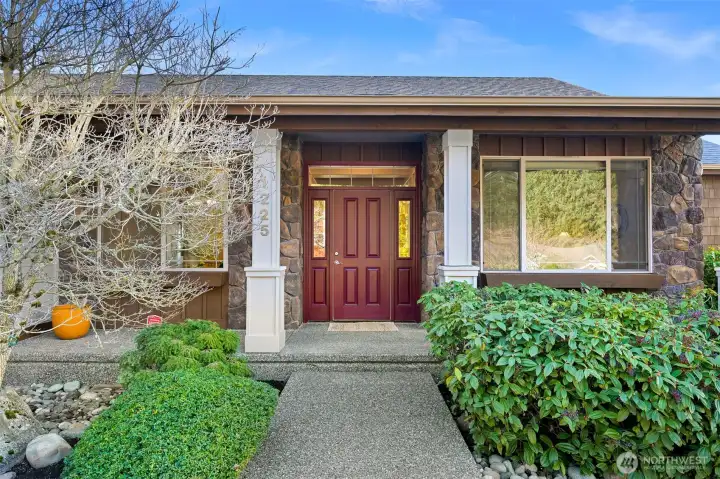 Covered front porch with planter boxes