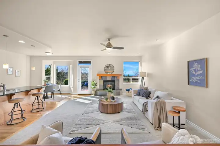 Living room with fireplace and wall of windows