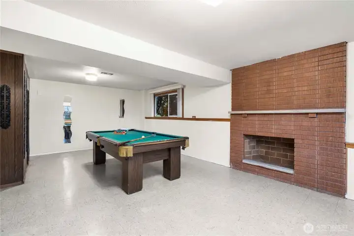 A cozy fireplace downstairs for cold weather