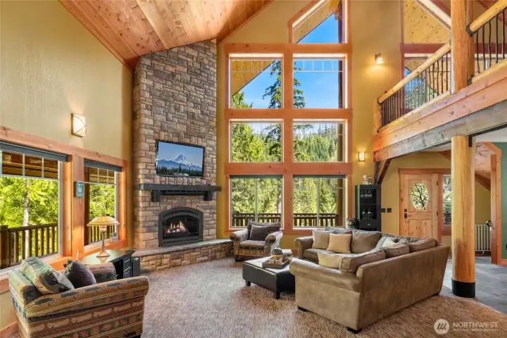 The second home features vaulted ceilings, fireplace and loft area.