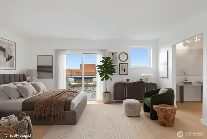 Upstairs to the upper level primary with the 250 sqft deck off the room.