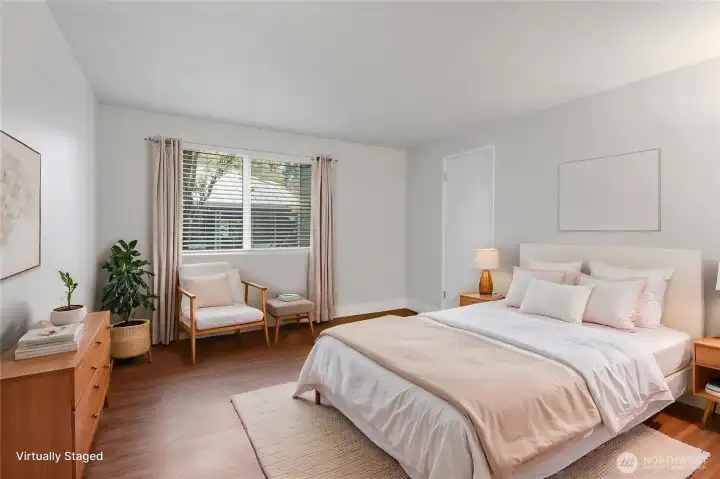 Bright and airy Primary Bedroom retreat with enough elbow room for those morning stretches. (virtually staged)