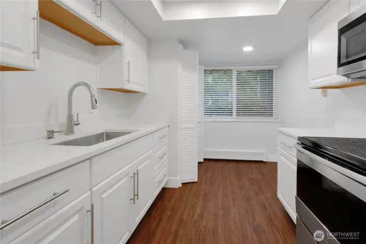There is room for a small table or portable kitehen island in this kitchen.