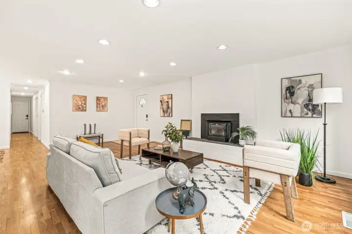 Inviting living room, with fireplace.