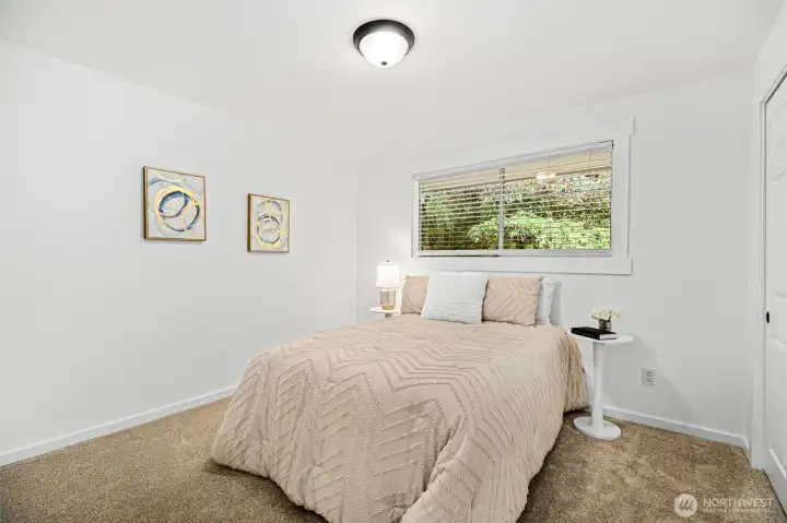 Guest bedroom with new carpet.