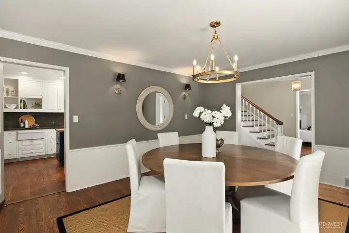 Thoughtfully positioned adjacent to the kitchen, the formal dining room provides an elegant backdrop for memorable meals and special occasions.