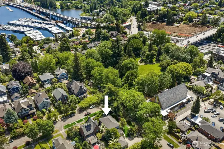 A truly special location, with Roanoke Park just steps from the front door. This prominent corner setting offers the beauty of open green space, mature trees, and a tranquil outlook rarely found so close to the city. Roanoke Park is a charming neighborhood park of approximately 2.2 acres. The park was acquired by the City of Seattle in 1908 and has long served as a treasured neighborhood gathering place.