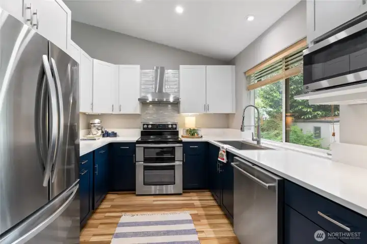 Nicely remodeled kitchen with custom cabinetry, SS and quartz Nicely remodeled kitchen with custom cabinetry, SS and quartz