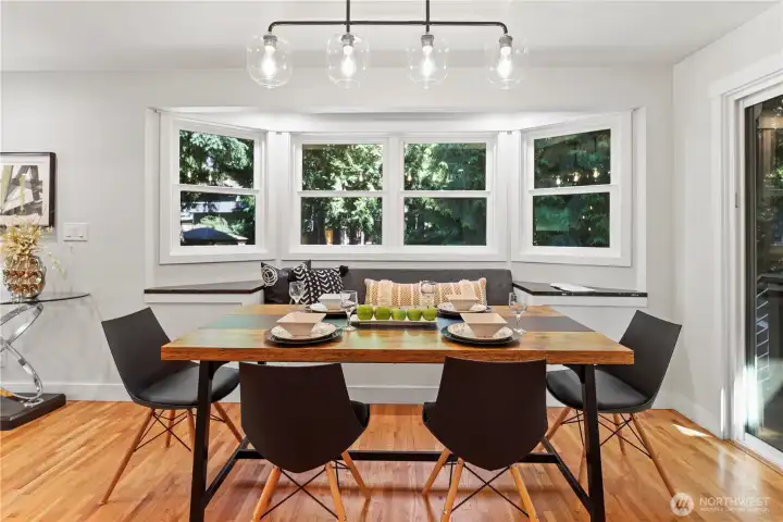 Lovely dining space with built-in bay window bench - so cozy! Lovely dining space with built-in bay window bench - so cozy!