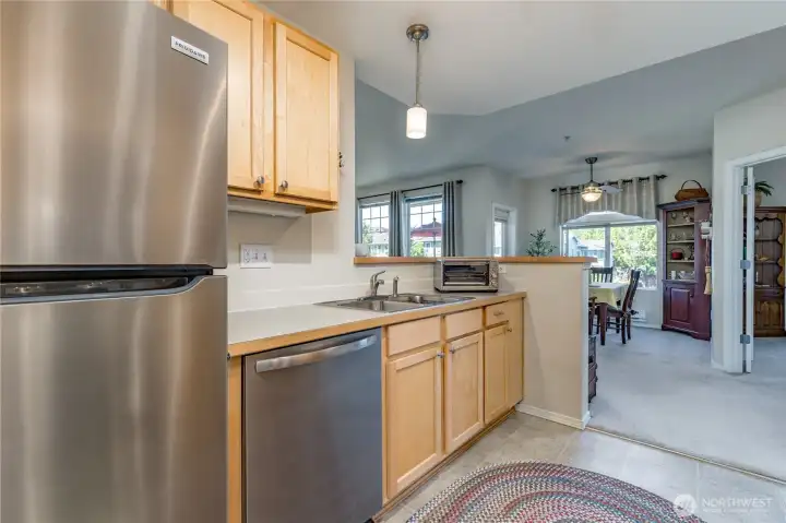 Kitchen overlooks the living areas. New sink and garbage disposal.