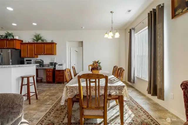 Eat in the dining room or at the kitchen countertop bar. The door beyond is the 4th bedroom.