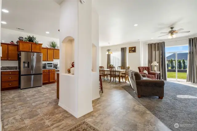 Step into the spacious kitchen or living room from the entry hall and enjoy your company!