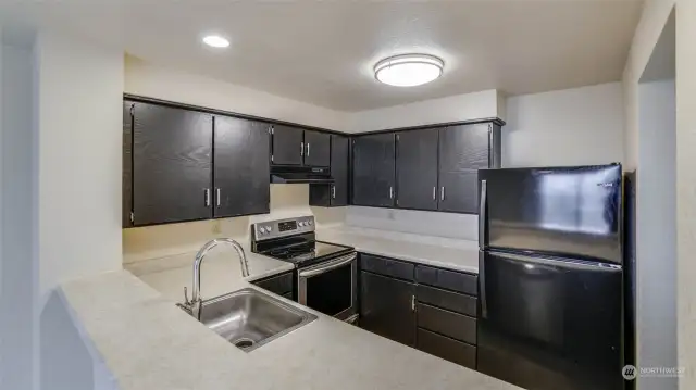 The kitchen sink conveniently located, overlooking the dining room; another plus for entertaining.