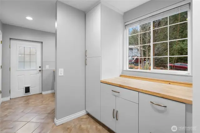 Laundry/Utilities/Mud  Room with extensive storage and pantry closet