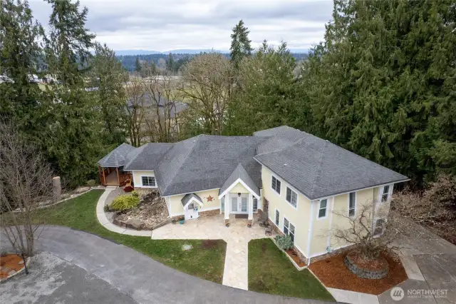 Surrounded by trees and views in multiple directions