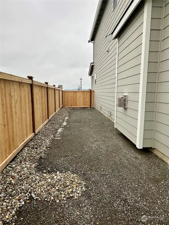 Side Yard - Disclaimer Secondary photos of same floor plan on different lot in different community: Photos are from another Warren, finishes, upgrades, and features may vary.