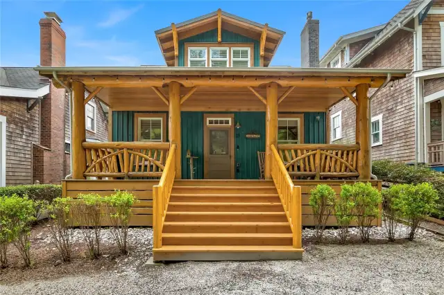 Into the Woods is known for its impressive real log front porch and corbels, custom designed from locally sourced cedar and pine  logs.
